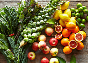 a group of fruits and vegetables on a wood surface Healthy Weight Loss Diets Wisbech